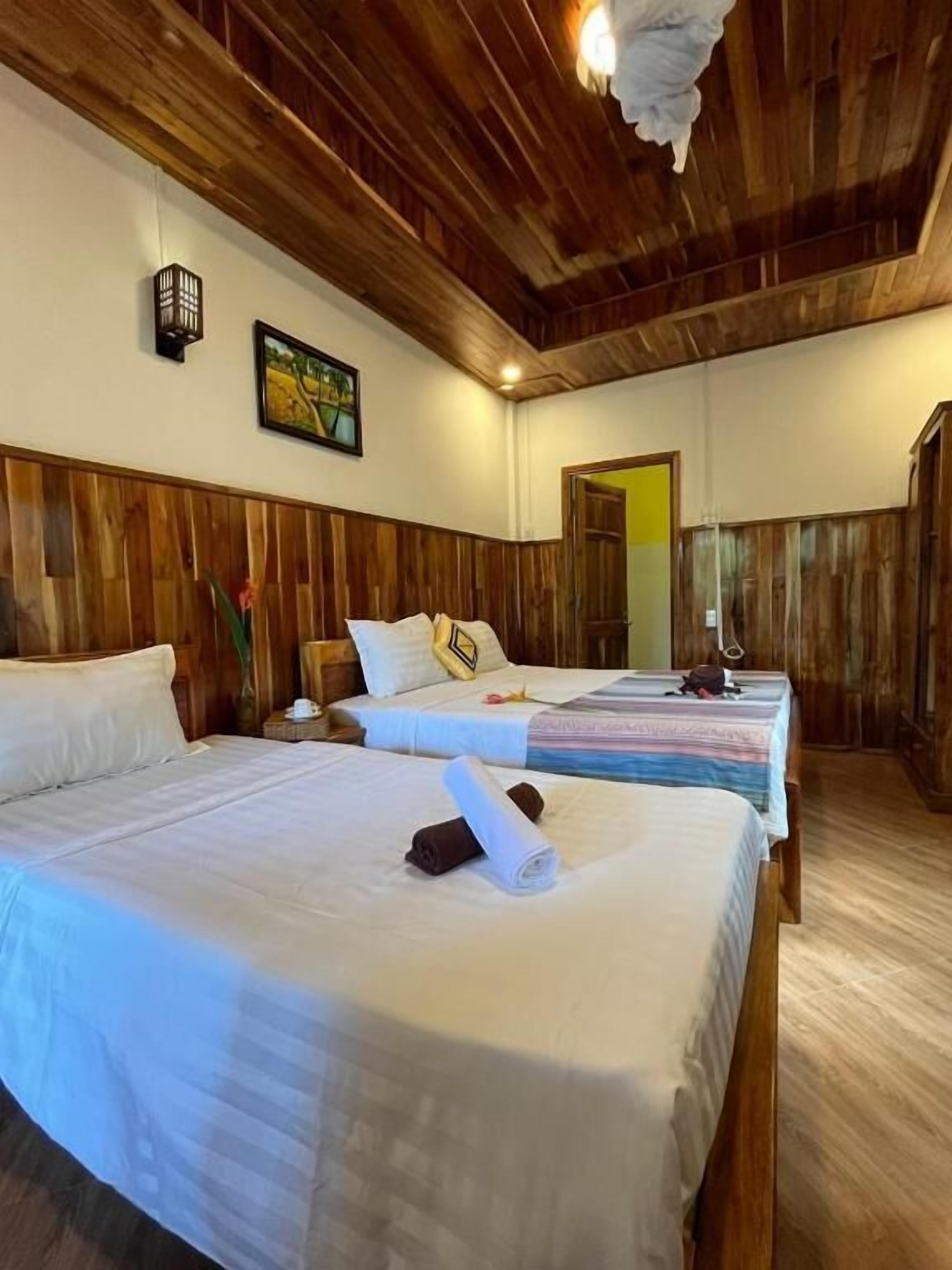 Triple Room, Balcony, Garden View | In-room safe, desk, laptop workspace, blackout curtains