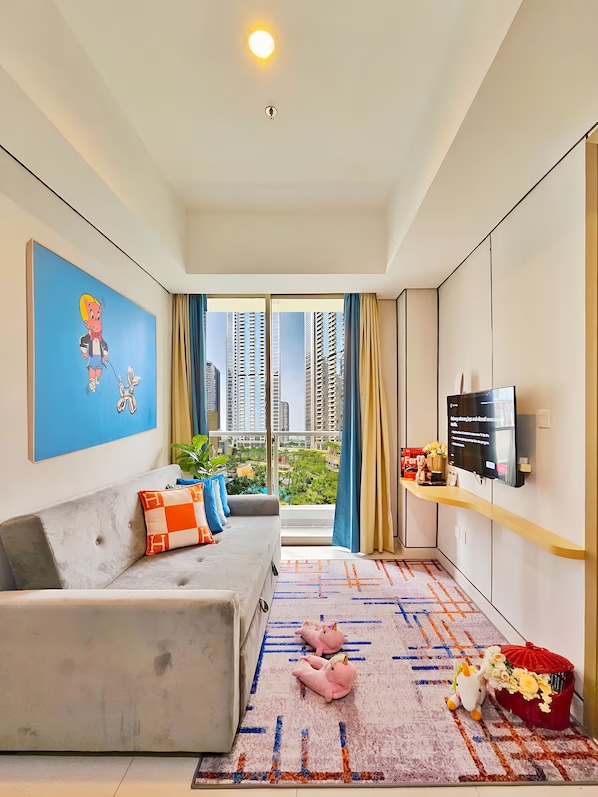 Apartment, 1 Bedroom, City View | Living area | 43-inch Smart TV with cable channels - Homi By SanLiving - 1 BR - Direct Mall (Jakarta)