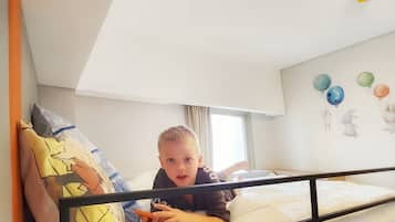 Apartment, 1 Bedroom, City View | Desk, laptop workspace, iron/ironing board, free WiFi