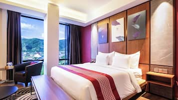 Junior Suite, Mountain View | In-room safe, desk, iron/ironing board, free WiFi