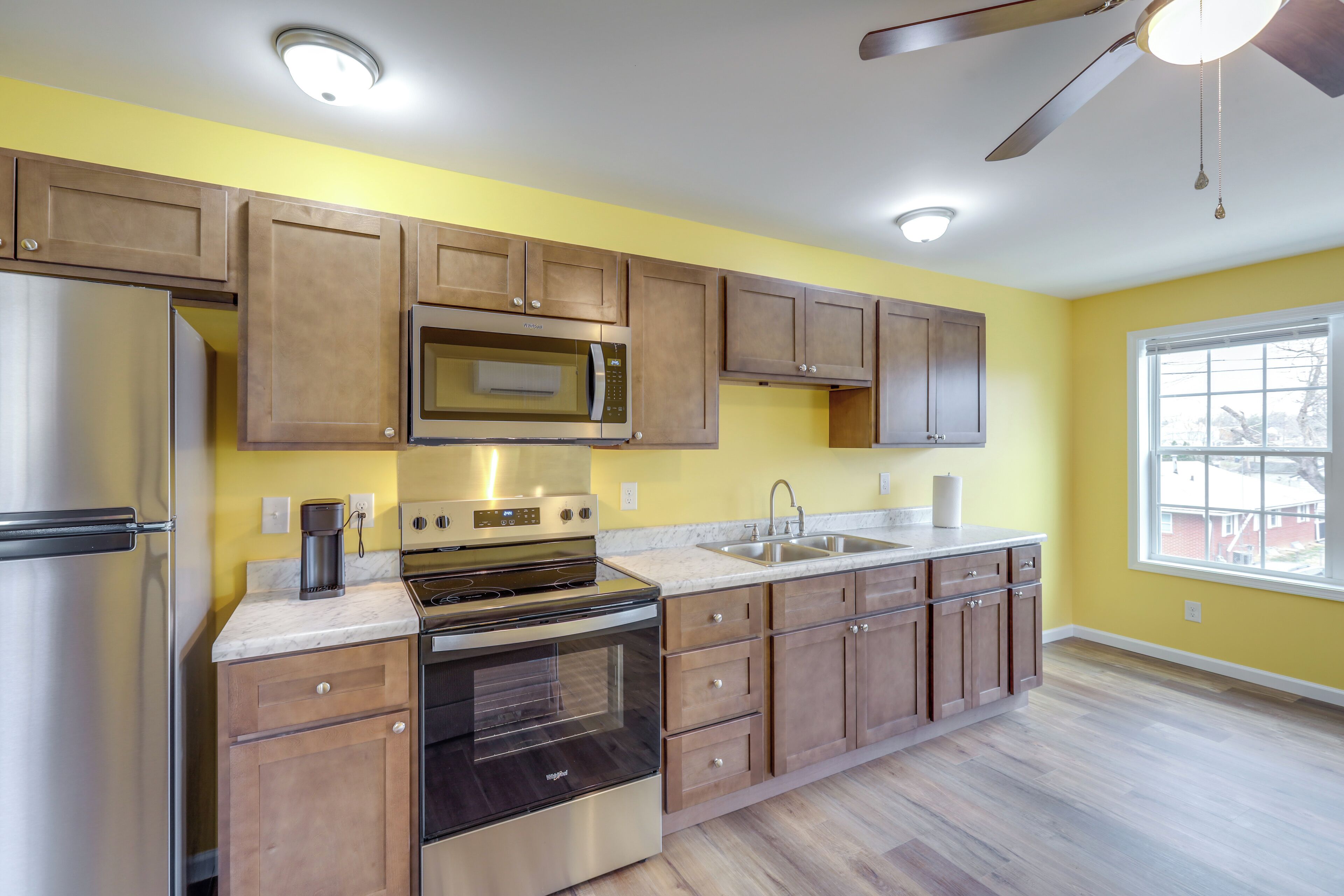 Fridge, microwave, stovetop, coffee/tea maker