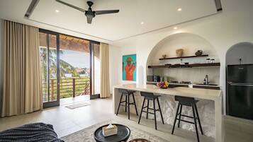 Deluxe Apartment, 1 Bedroom, Ensuite, Pool View | Living area