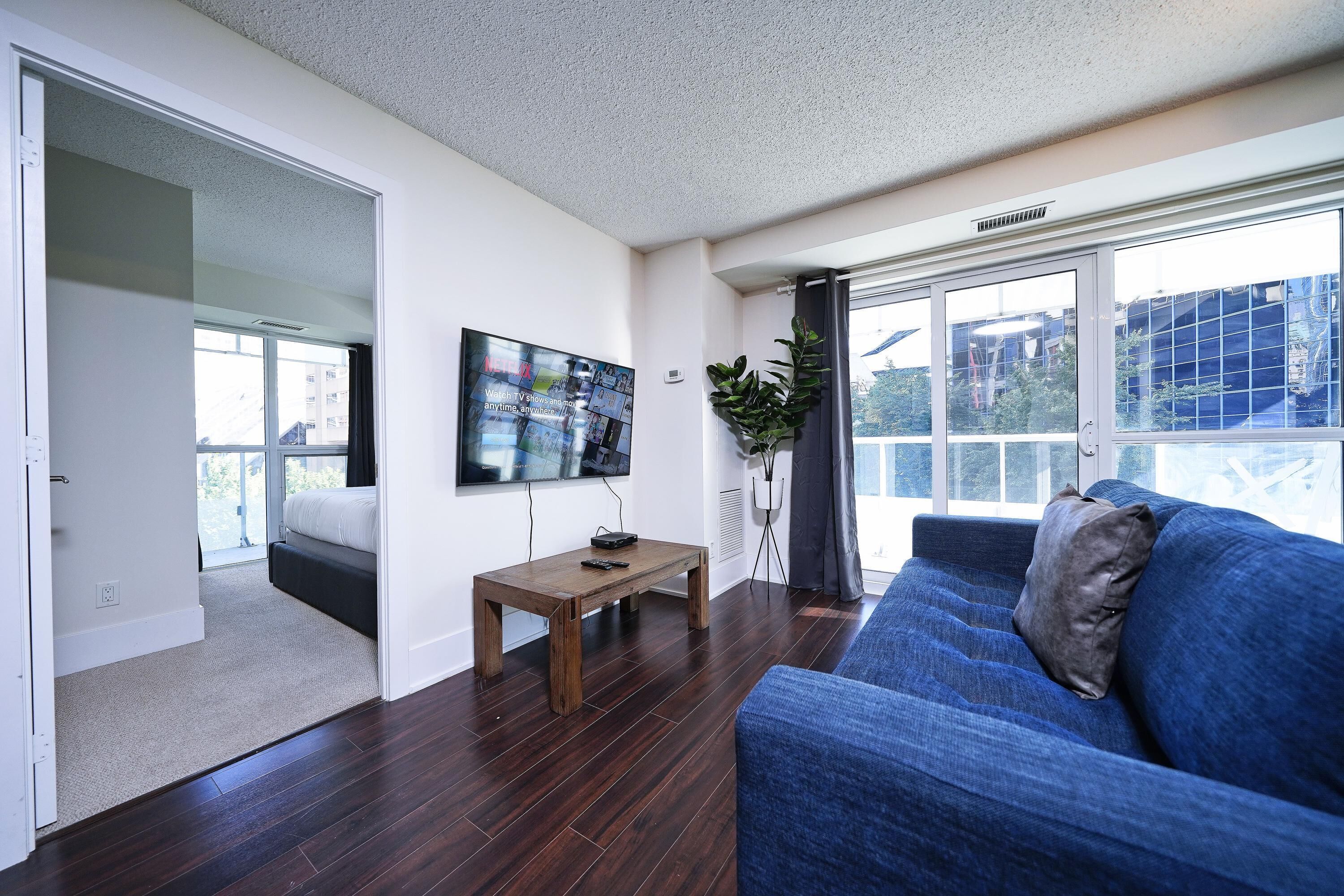 Suite Eksekutif, 2 kamar tidur | Area keluarga | Televisi layar datar 50-inci dengan saluran TV kabel