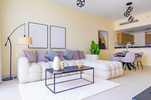 Apartment, Balcony, Partial Sea View | Living area - Bloomfields 1BR Canal The View Raha (Abu Dhabi)