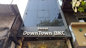 A hotel sign with the name "Hotel DownTown BKC". - Hotel Downtown-Near US Embassy (Mumbai)
