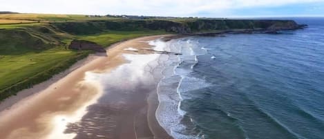 On the beach, beach towels