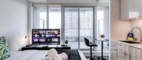 Estudio urbano, 1 cama Queen size, para no fumadores | Área de sala de estar