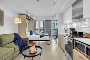 Economy Studio, 1 Queen Bed with Sofa bed, Non Smoking | Living area