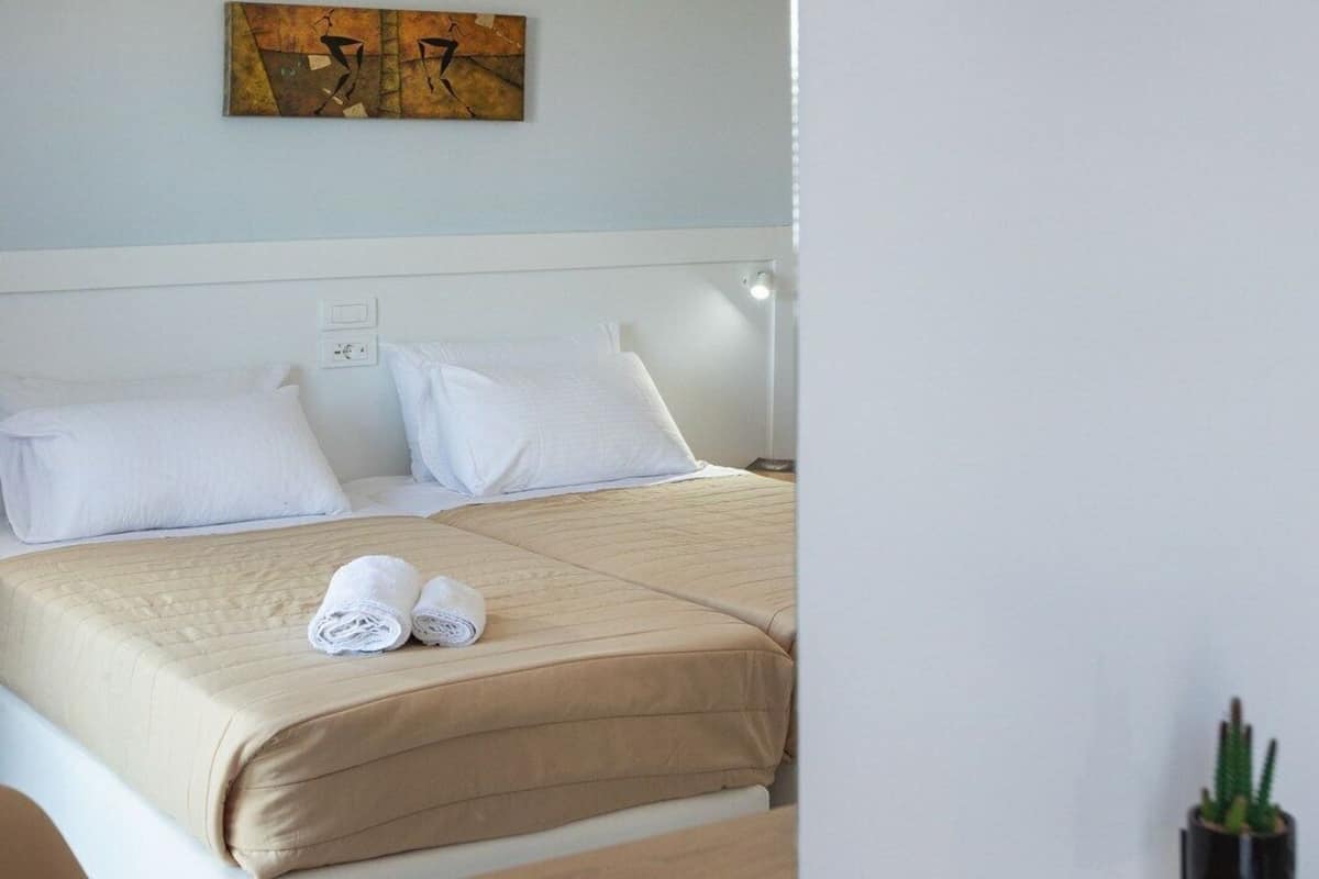 Twin Room with Pool View | In-room safe, iron/ironing board