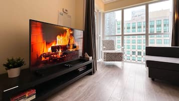 Suite Ville, plusieurs chambres, non-fumeur | Coin séjour