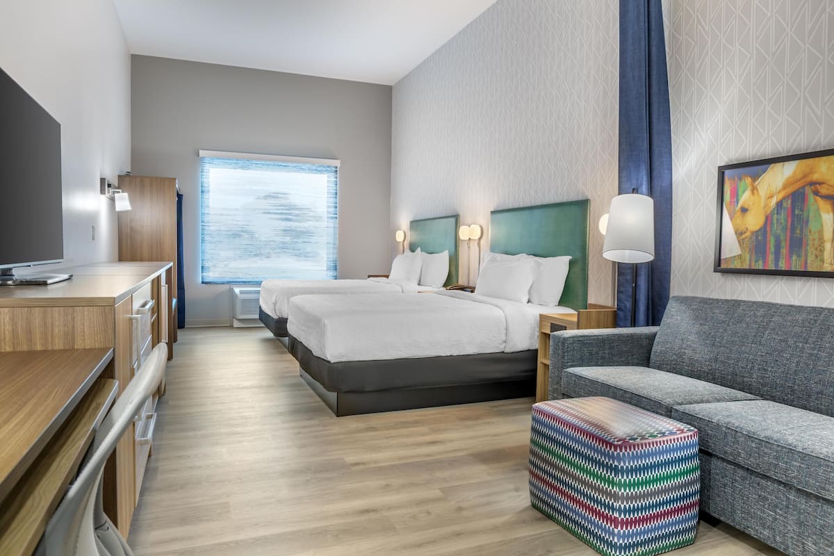 Suite Studio, 2 grands lits | Coin séjour