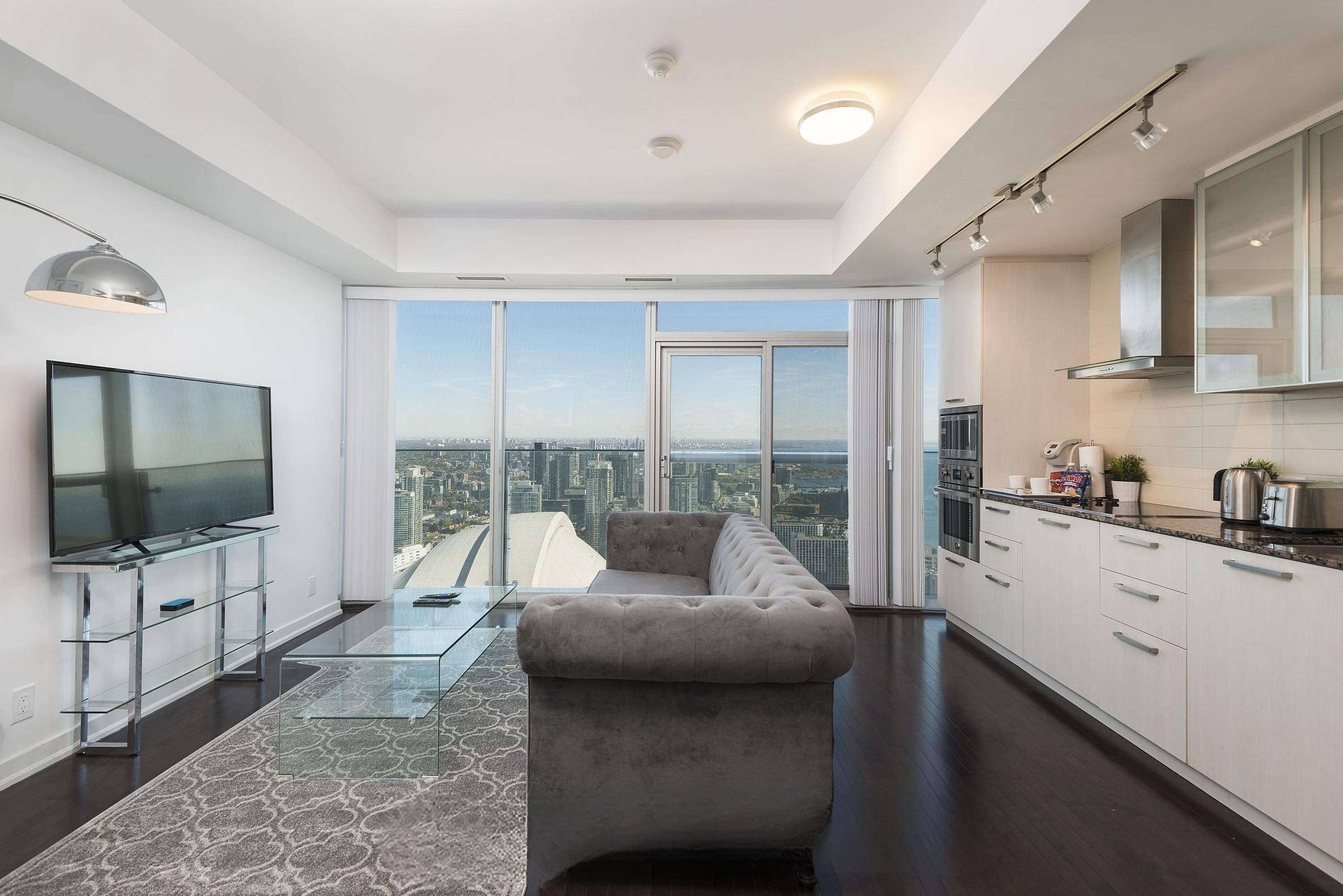 Premier Room, 1 Queen Bed with Sofa bed | Living area | 50-inch flat-screen TV with cable channels