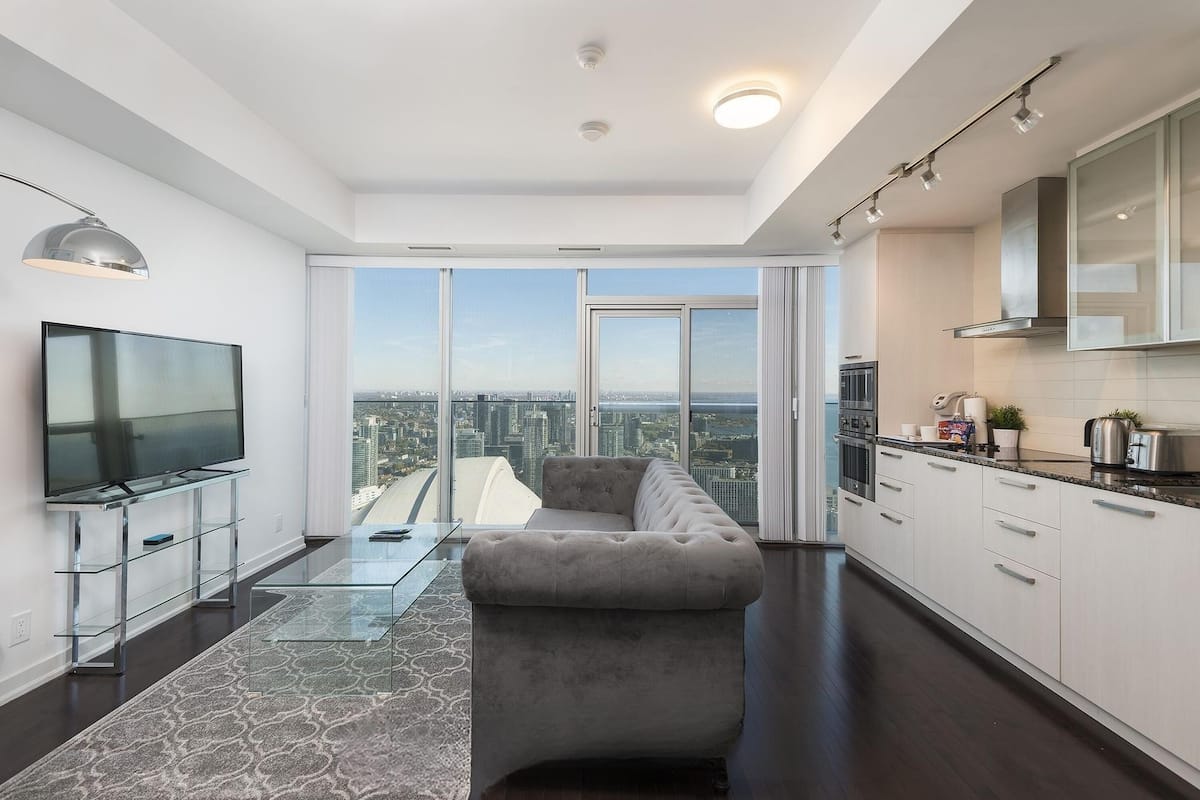 Premier Room, 1 Queen Bed with Sofa bed | Living area | 50-inch flat-screen TV with cable channels