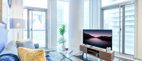 Classic Suite, 1 Queen Bed | Living area | 50-inch flat-screen TV with cable channels