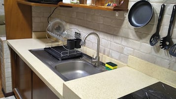 Fridge, microwave, stovetop, coffee/tea maker