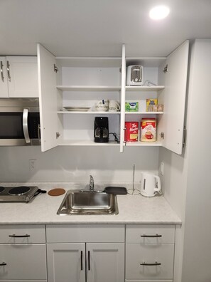 Fridge, microwave, dishwasher, coffee/tea maker - A Modern & Homely 1 BR Suite (Winnipeg)