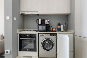 Apartment, Balcony, Canal View | Private kitchen | Toaster - Canal View 1BR Near Business Bay Metro (Dubai)