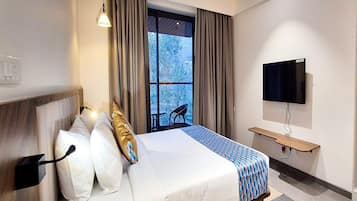 1 bedroom, desk, bed sheets