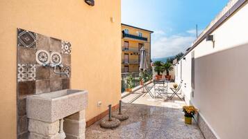 Apartment, Kitchen, City View | Terrace/patio