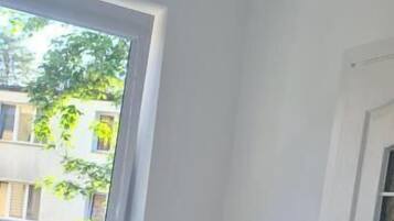 Deluxe Triple Room, Courtyard View | Interior