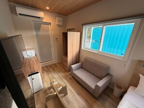 Habitación individual estándar, microondas, vista al jardín | Camas con efecto memoria, escritorio, wifi gratis y ropa de cama