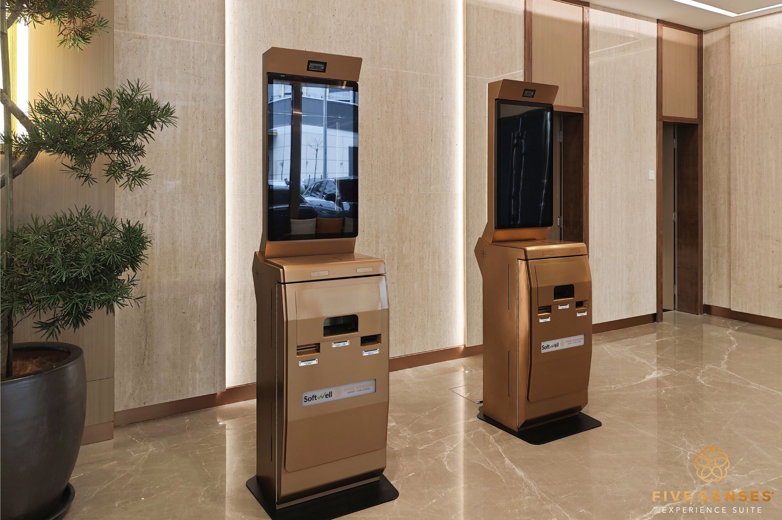 A modern elevator with a digital display and a control panel, situated in a well-lit hallway with marble flooring and wooden paneling.