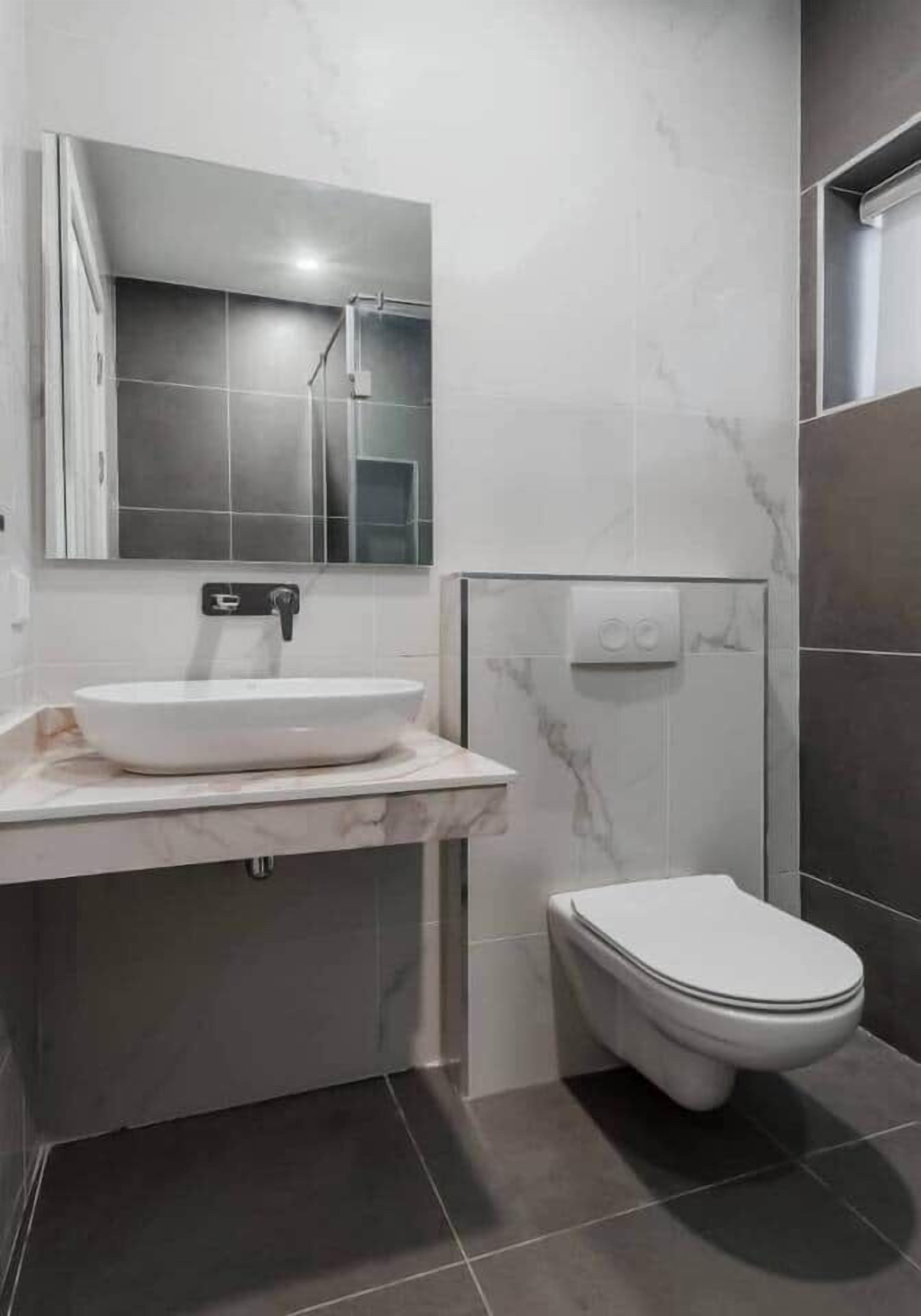Shower, bidet, toilet paper