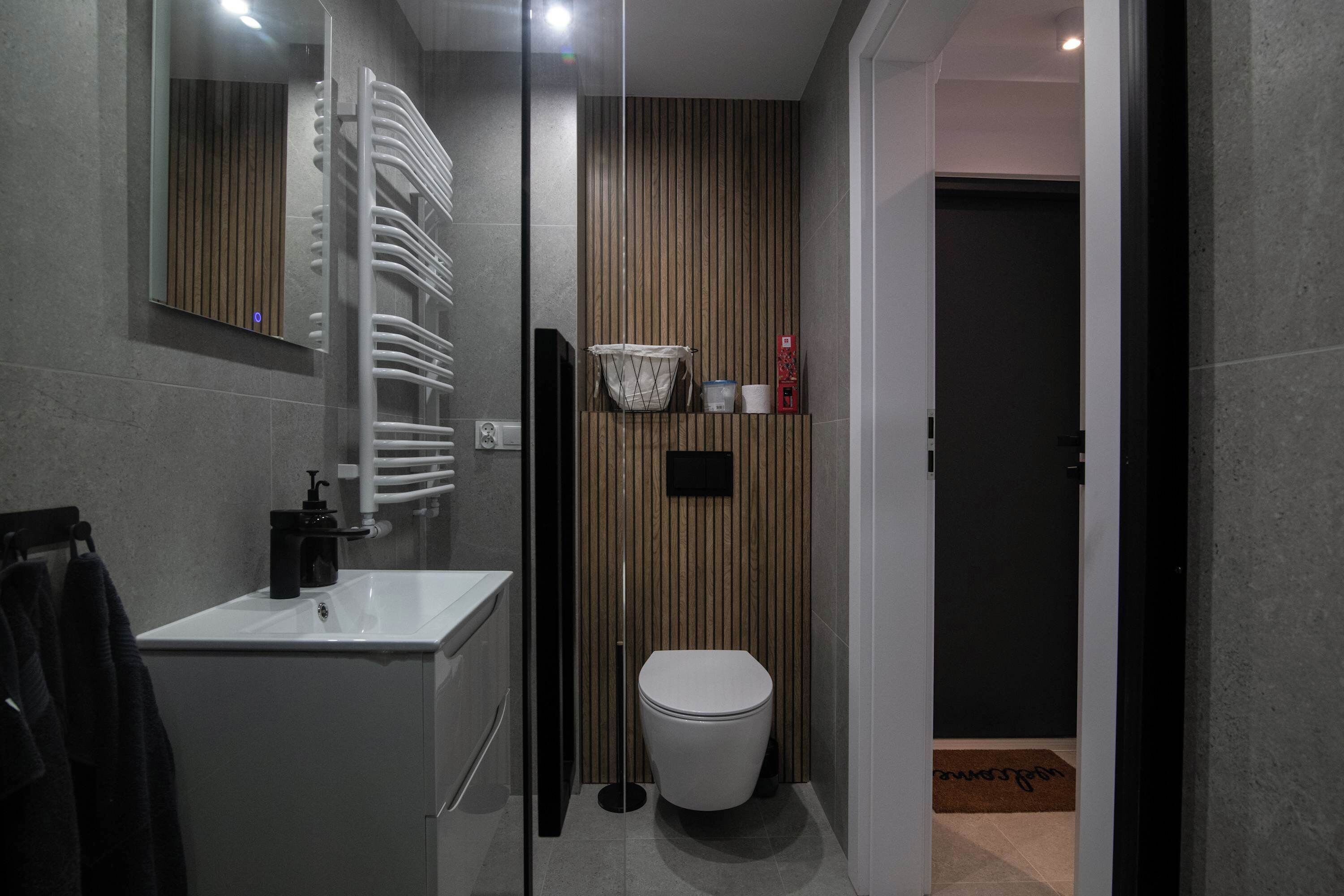 Shower, hair dryer, towels, shampoo