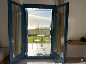Studio Deluxe, patio, vue mer | Intérieur