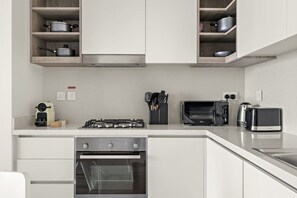 Private kitchen - FIRST CLASS | 1BR | Luxury Meets Ease (Downtown)