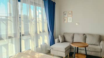 Comfort Triple Room | Living area