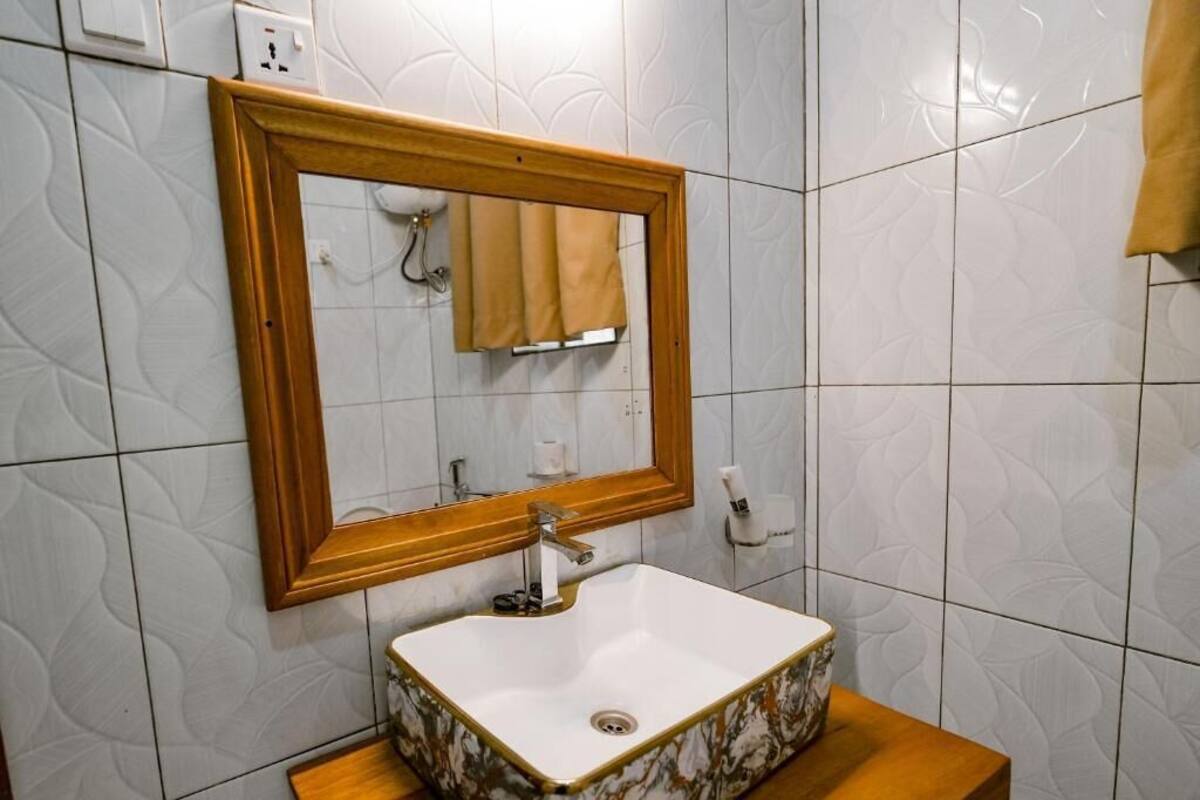 Departamento Deluxe, balcón, vista al jardín | Baño