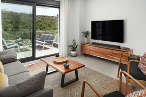 TV - Modern Apartment with Rooftop Pool - Carvajal (Fuengirola)