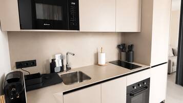 Penthouse Deluxe, quang cảnh biển | Bếp riêng | Tủ lạnh, lò vi sóng, lò nướng, bếp nấu