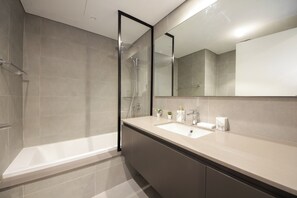 Hair dryer, bidet, towels, soap - Silk Valley - Luxury 1BR: Steps away from Dining and Entertainment (Sharjah)