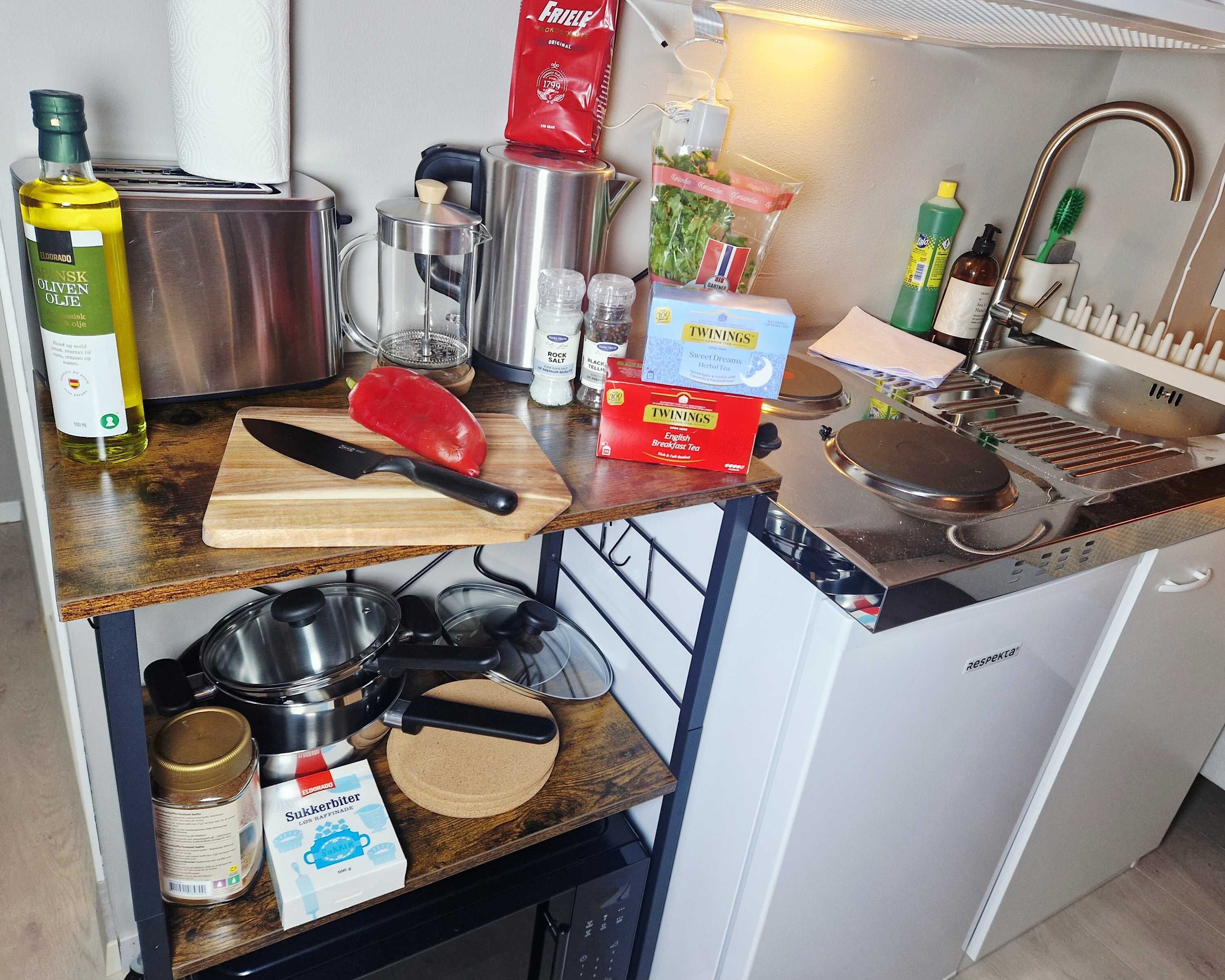 Fridge, microwave, stovetop, coffee/tea maker