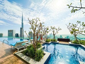 2 outdoor pools, open 7:00 AM to 7:00 PM, pool umbrellas, sun loungers - Lucky Getaways (Dubai)