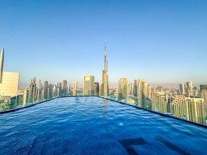 2 outdoor pools, open 7:00 AM to 7:00 PM, pool umbrellas, sun loungers - Lucky Getaways (Dubai)