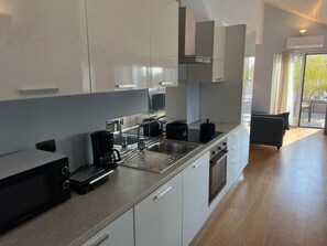 Fridge, microwave, oven, dishwasher - Penthouse Don Minzoni in Verbania with terrace (Verbania)