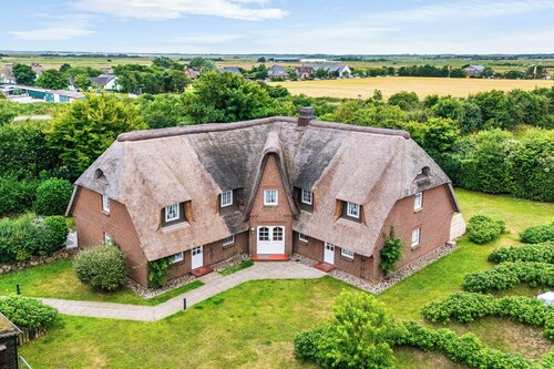 Ferienwohnung Reethüüs in Keitum auf Sylt unter Reet mit Terrasse & Strandkorb