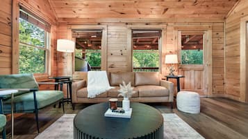 Signature Cabin, 2 Bedrooms, Hot Tub | Living room | 32-inch Smart TV with digital channels, fireplace