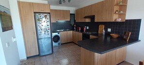 Private kitchen - Stylish two-room apartment with character & balcony (Swakopmund)