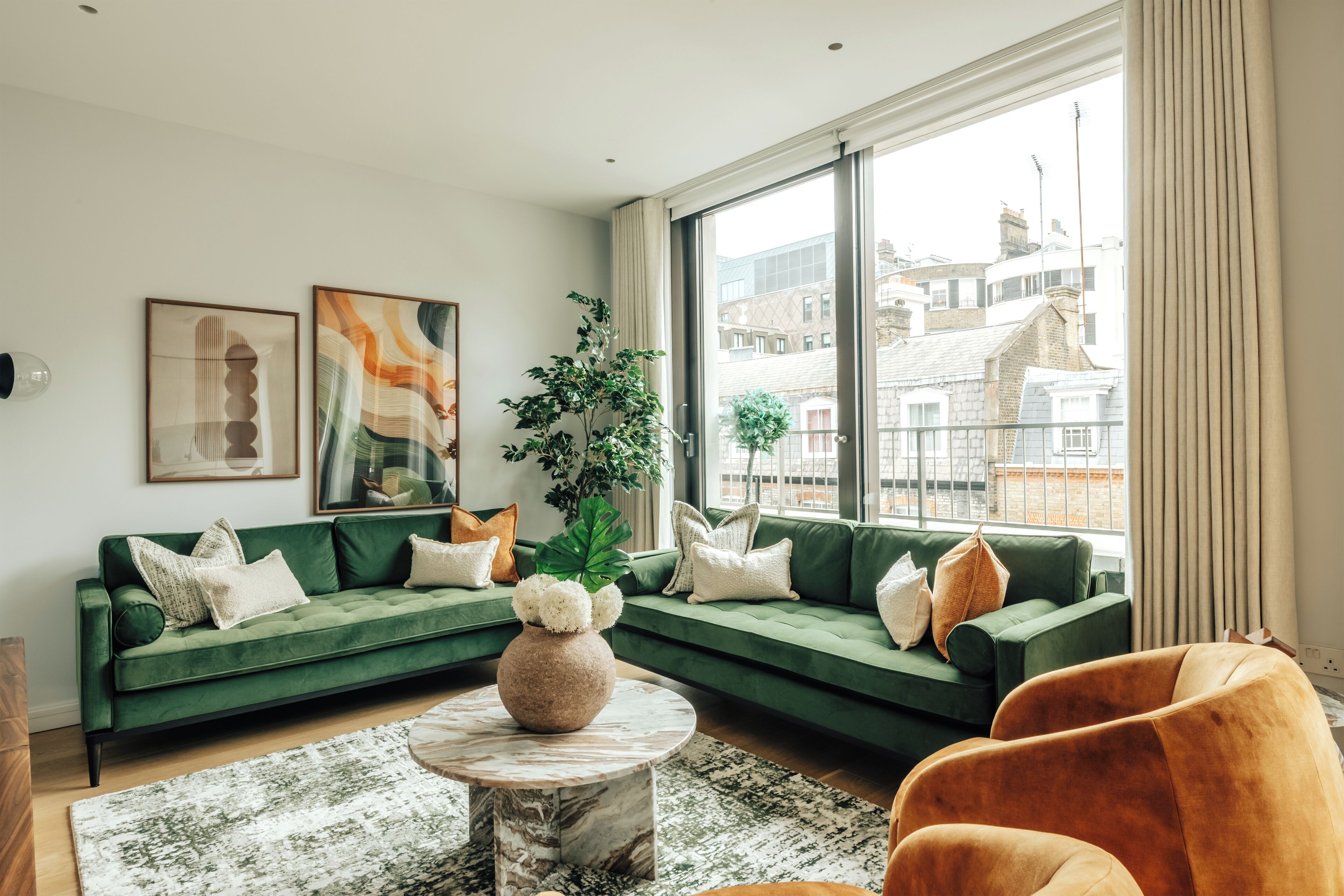 Deluxe Apartment, 2 Bedrooms, Air conditioning | Living area | 55-inch flat-screen TV with digital channels