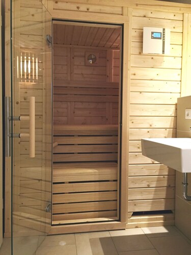 Modern vacation home with its own sauna, whirlpool bath and terrace