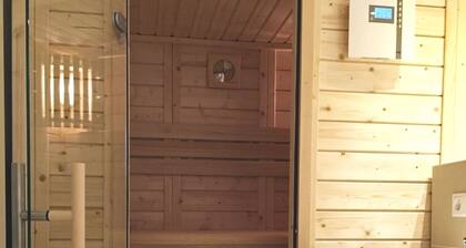 Modern vacation home with its own sauna, whirlpool bath and terrace