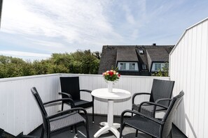 Outdoor dining - Cozy vacation apartment on the 1st floor in a quiet location in Wenningstedt (Wenningstedt)