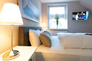 2 bedrooms, free WiFi, bed sheets - 3-room apartment on the upper floor in a quiet location in Alt-Westerland (Westerland)