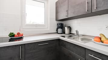 Réfrigérateur, four, plaque de cuisson, lave-vaisselle