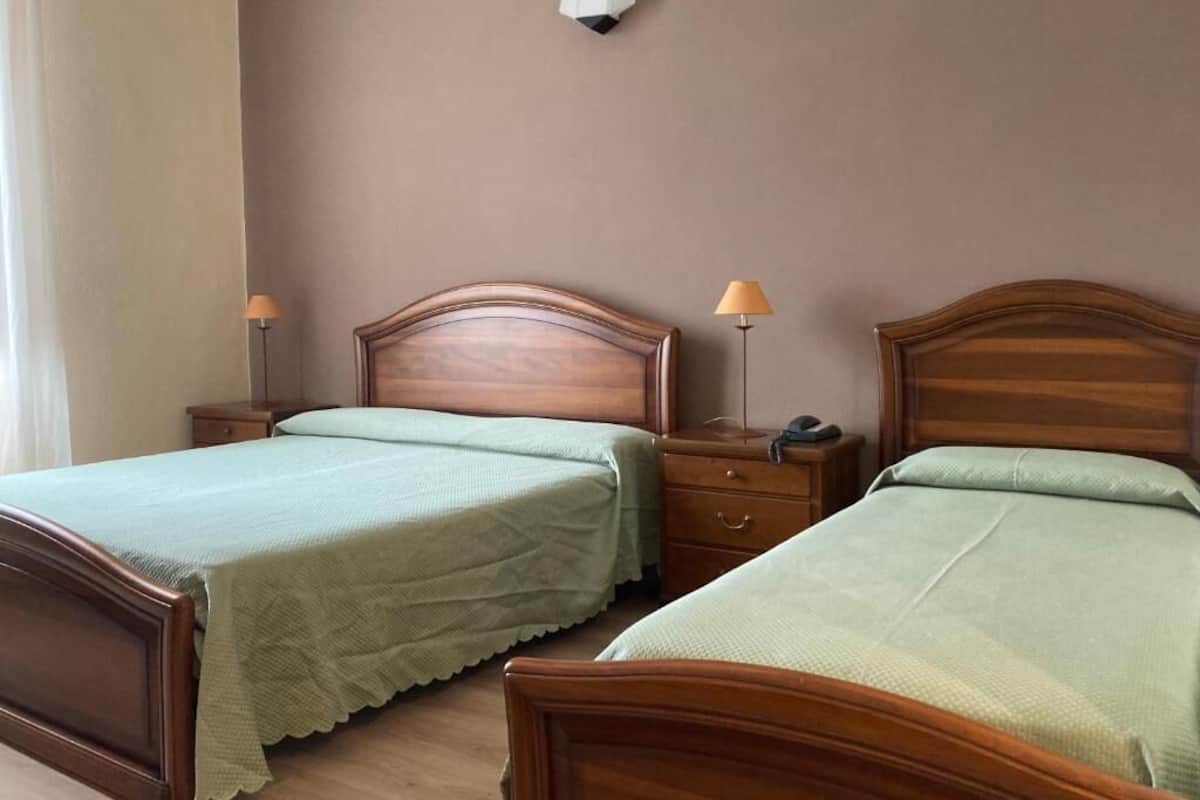 Classic Triple Room, Pool View | Free WiFi