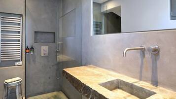 Shower, towels, soap, shampoo